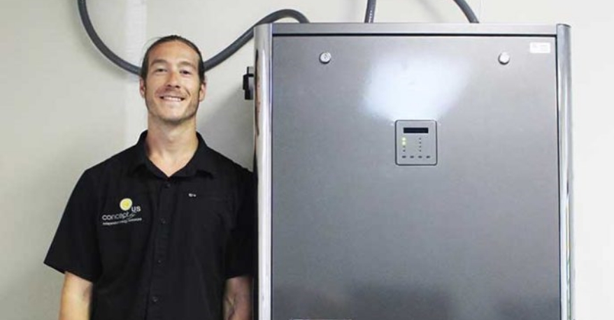 generator guy Guy standing next to a generator