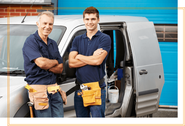 Commercial Contractor happy contractors leaning on their truck