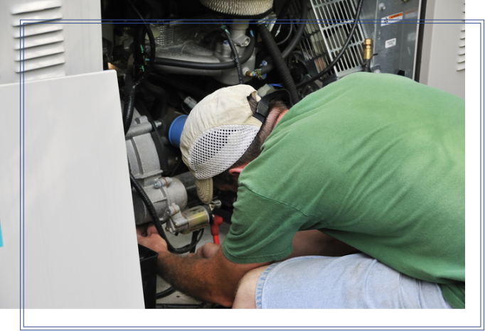 A technician looking at a residential generator