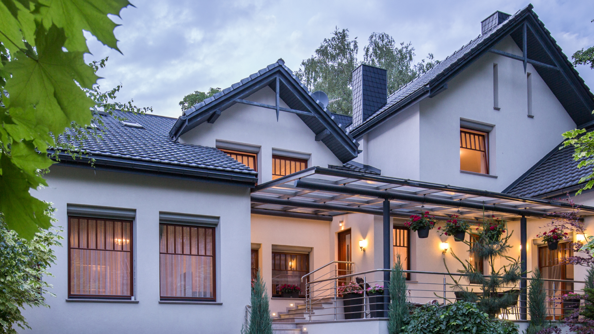 white house with lights on in Greenwich, connecticut